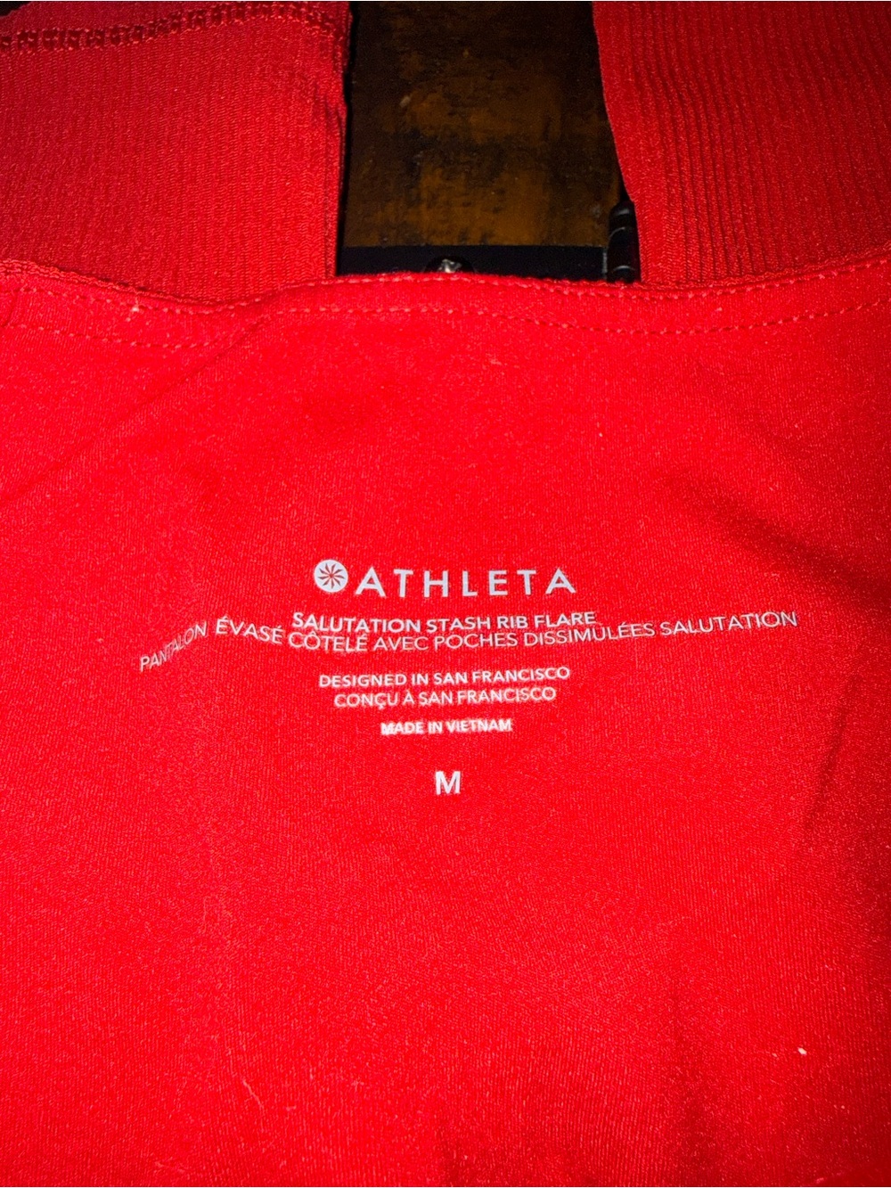 Athleta salutation slash rib flare red ribbed leggings size medium pockets